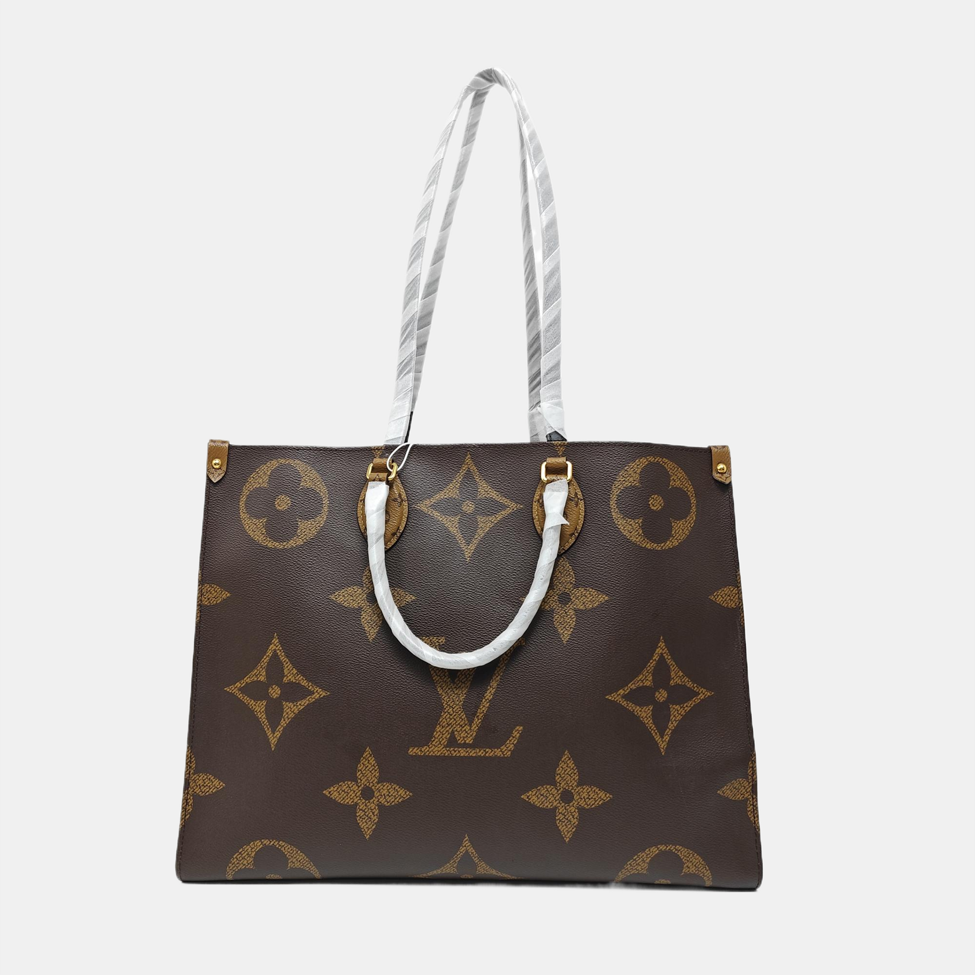 ONTHEGO GM Monogram Coated Canvas Brown