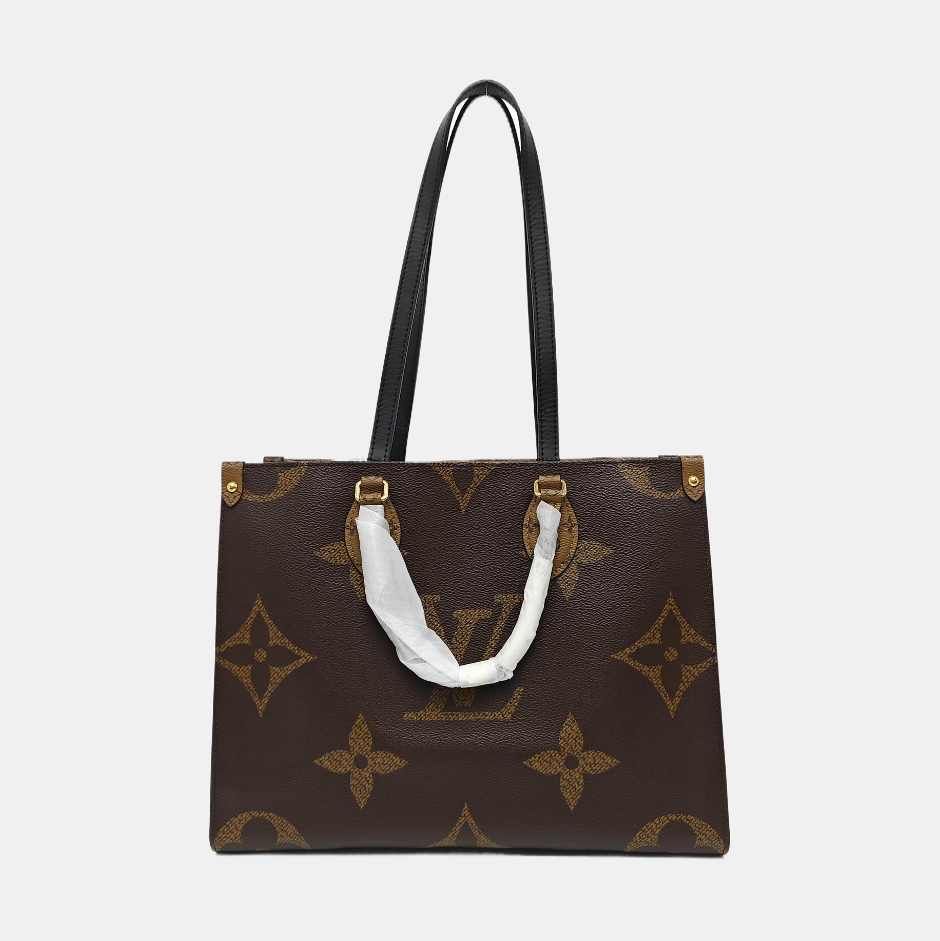 ONTHEGO MM Monogram Coated Canvas Brown