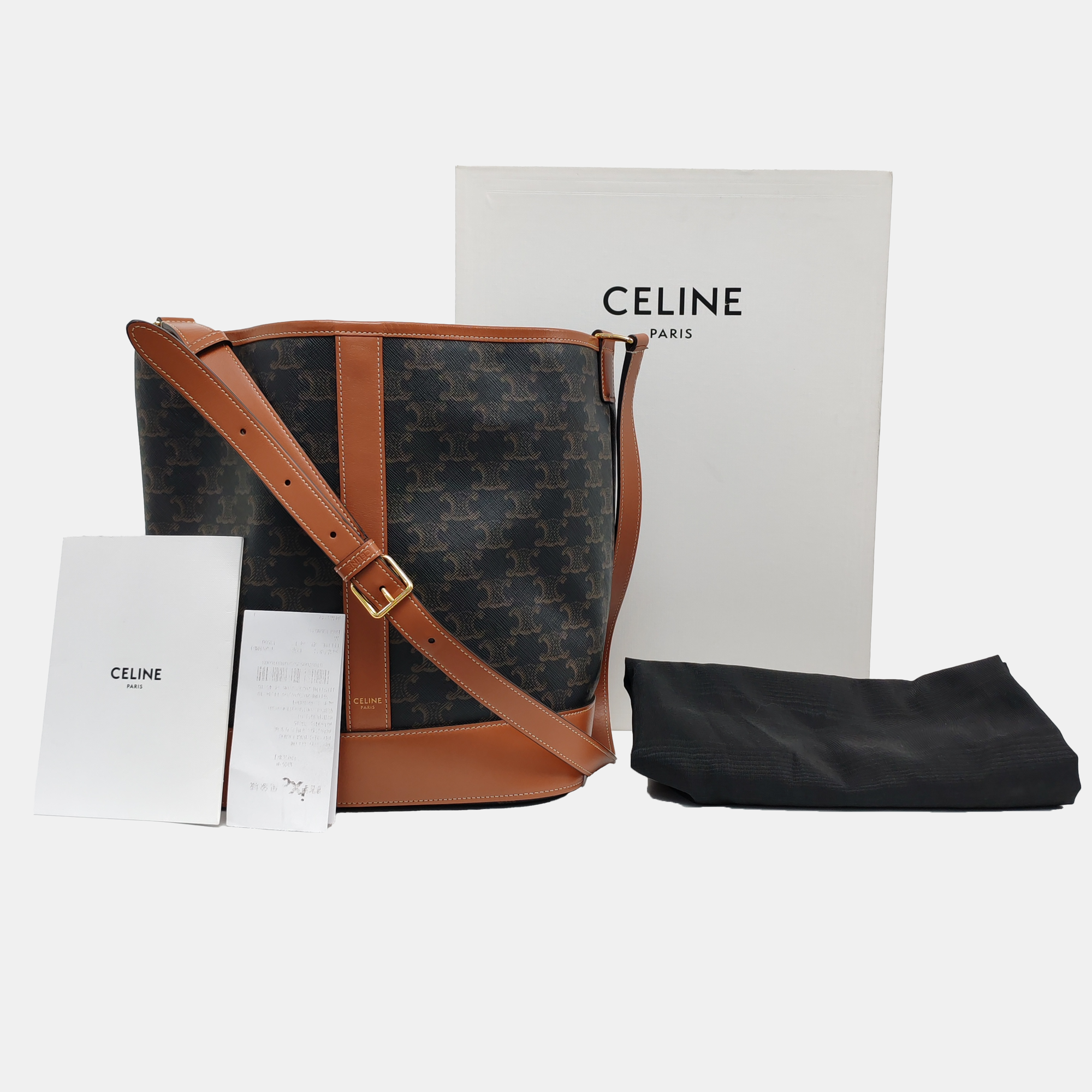 Authenticated pre-owned  TRIOMPHE CANVAS Medium Coated Canvas Brown - Bucket Bag at Looply