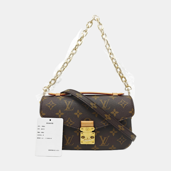 MÉTIS EAST WEST Monogram Coated Canvas Brown