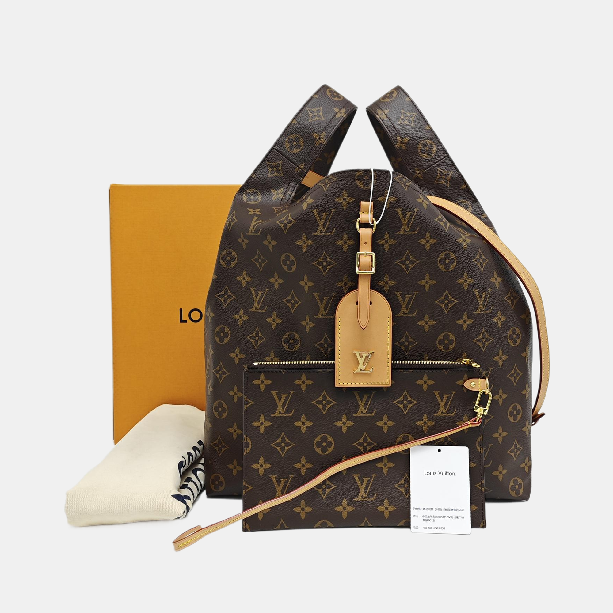 ATLANTIS Monogram Coated Canvas Brown
