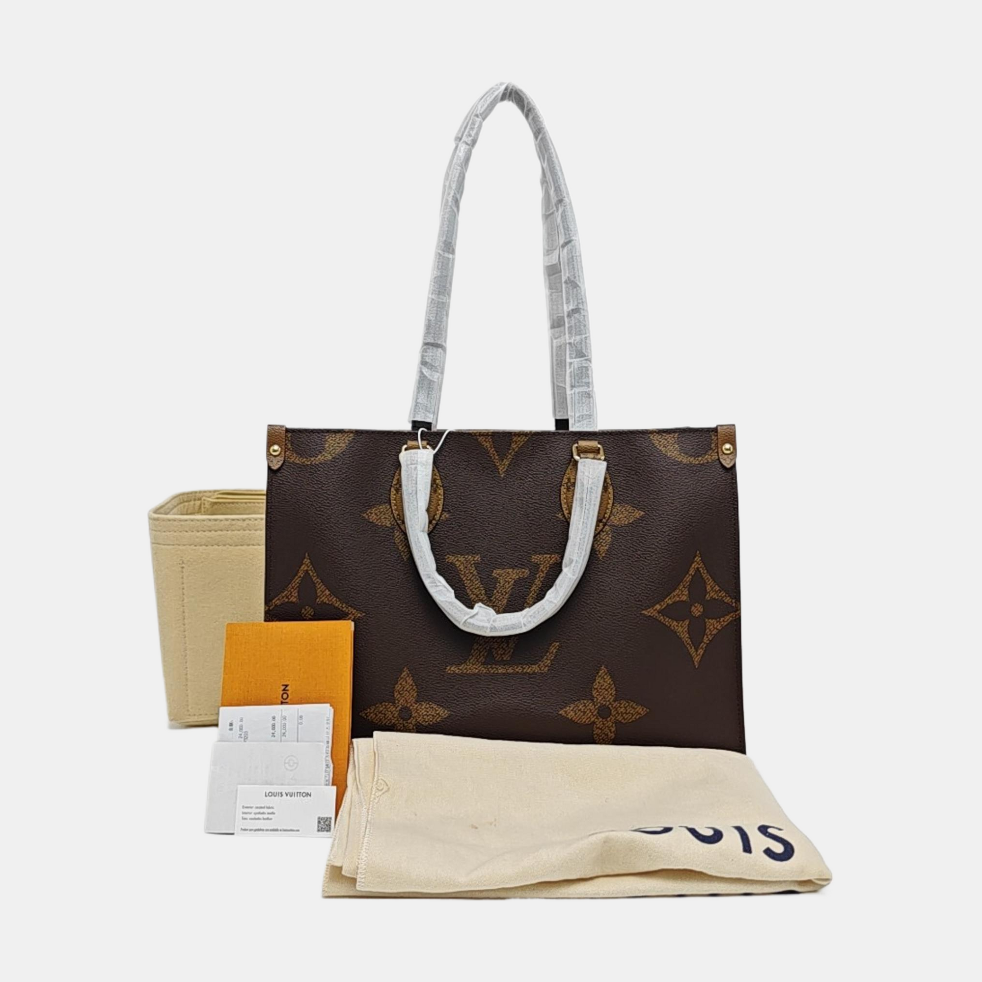 ONTHEGO MM Monogram Coated Canvas Brown