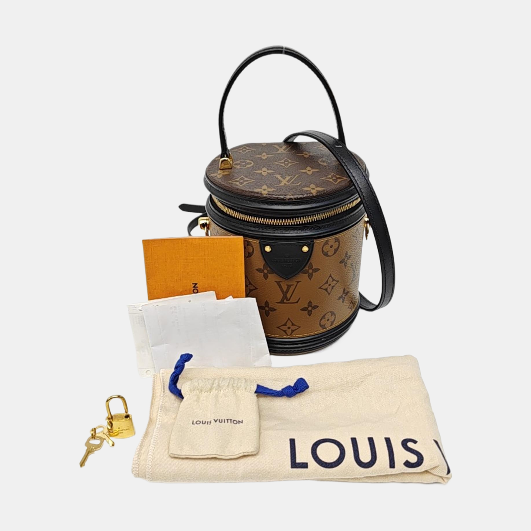CANNES PM Monogram Coated Canvas Brown