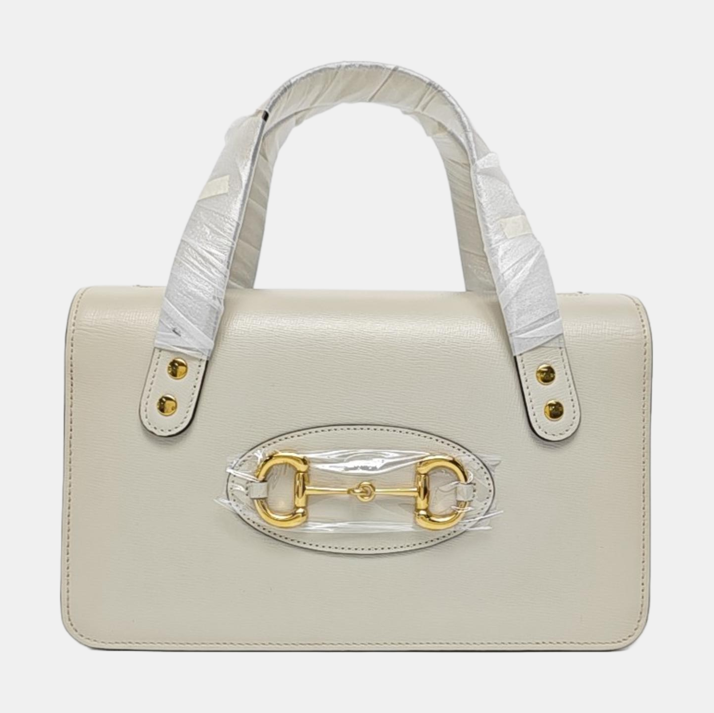 Authenticated pre-owned  Horsebit 1955 Calfskin White - Top Handle Bag at Looply