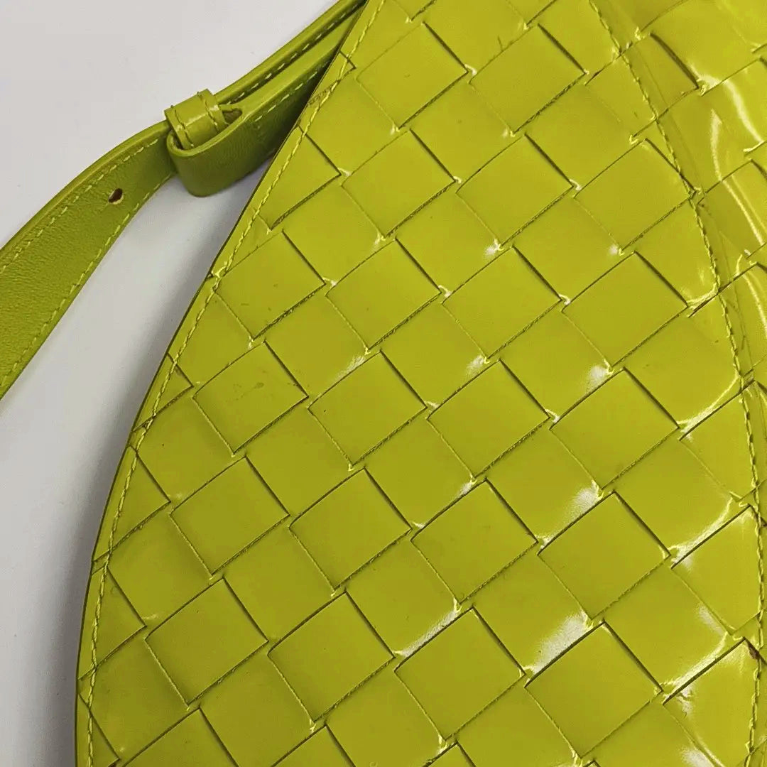 Authenticated pre-owned  Intrecciato Patent Leather Yellow - Top Handle Bag at Looply