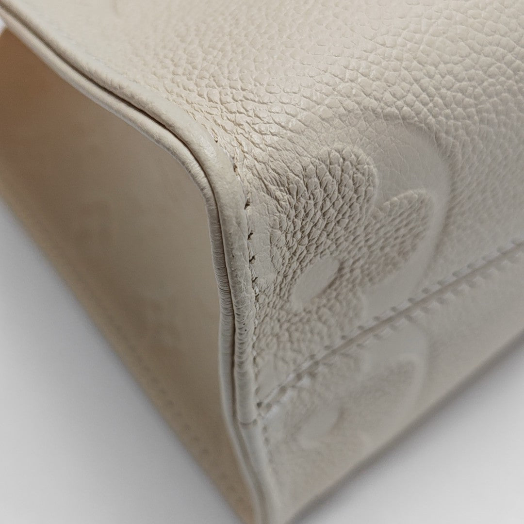 ONTHEGO PM Monogram Calfskin Beige