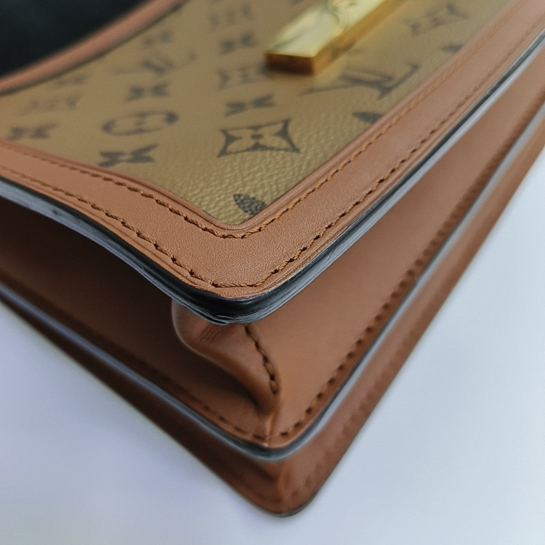 DAUPHINE MM Monogram Coated Canvas Brown