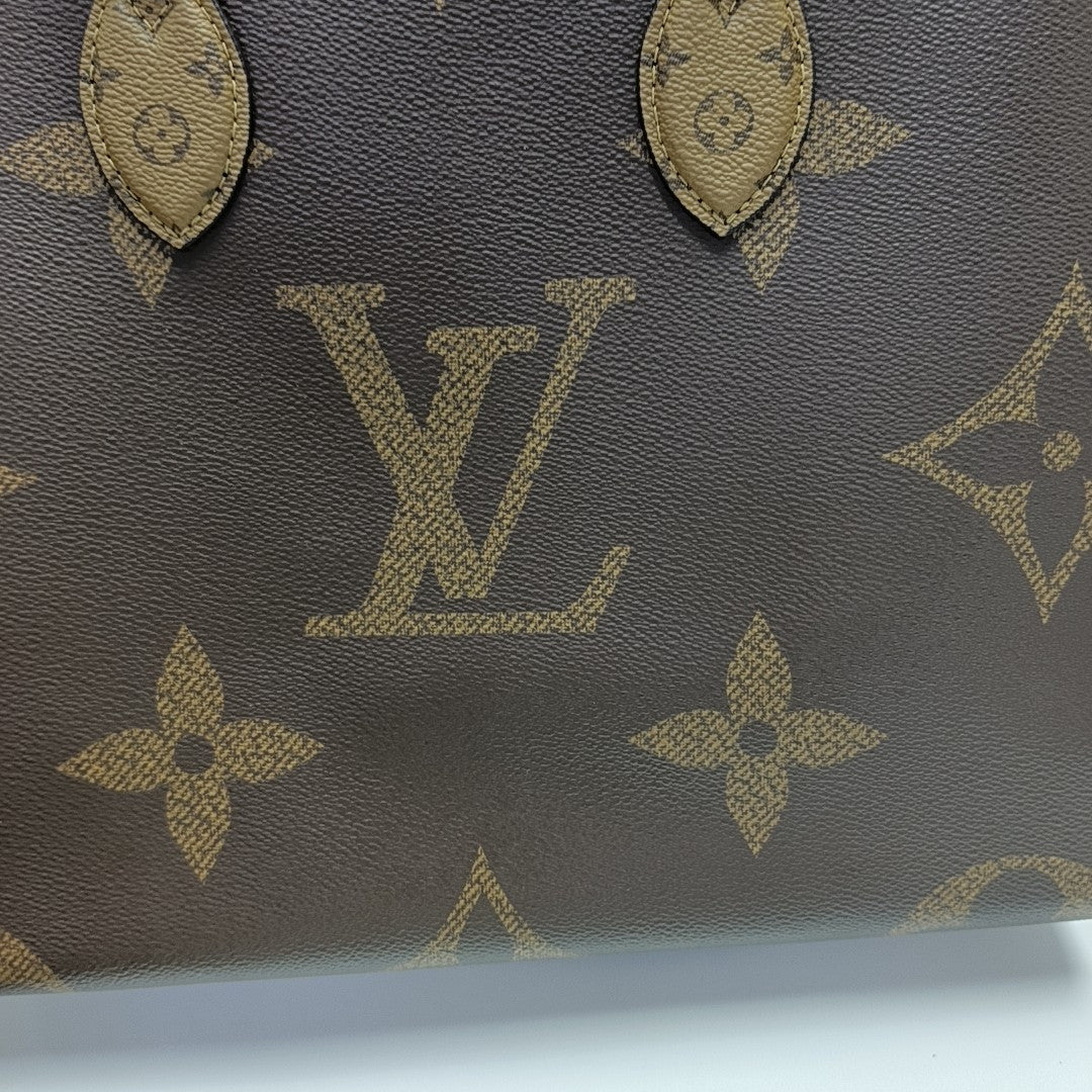 ONTHEGO MM Monogram Coated Canvas Brown