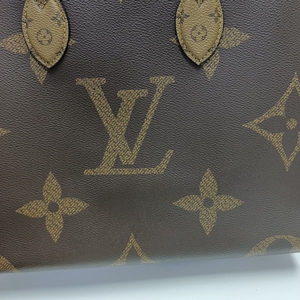 ONTHEGO MM Monogram Coated Canvas Brown