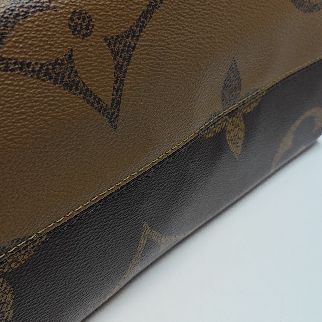 ONTHEGO MM Monogram Coated Canvas Brown