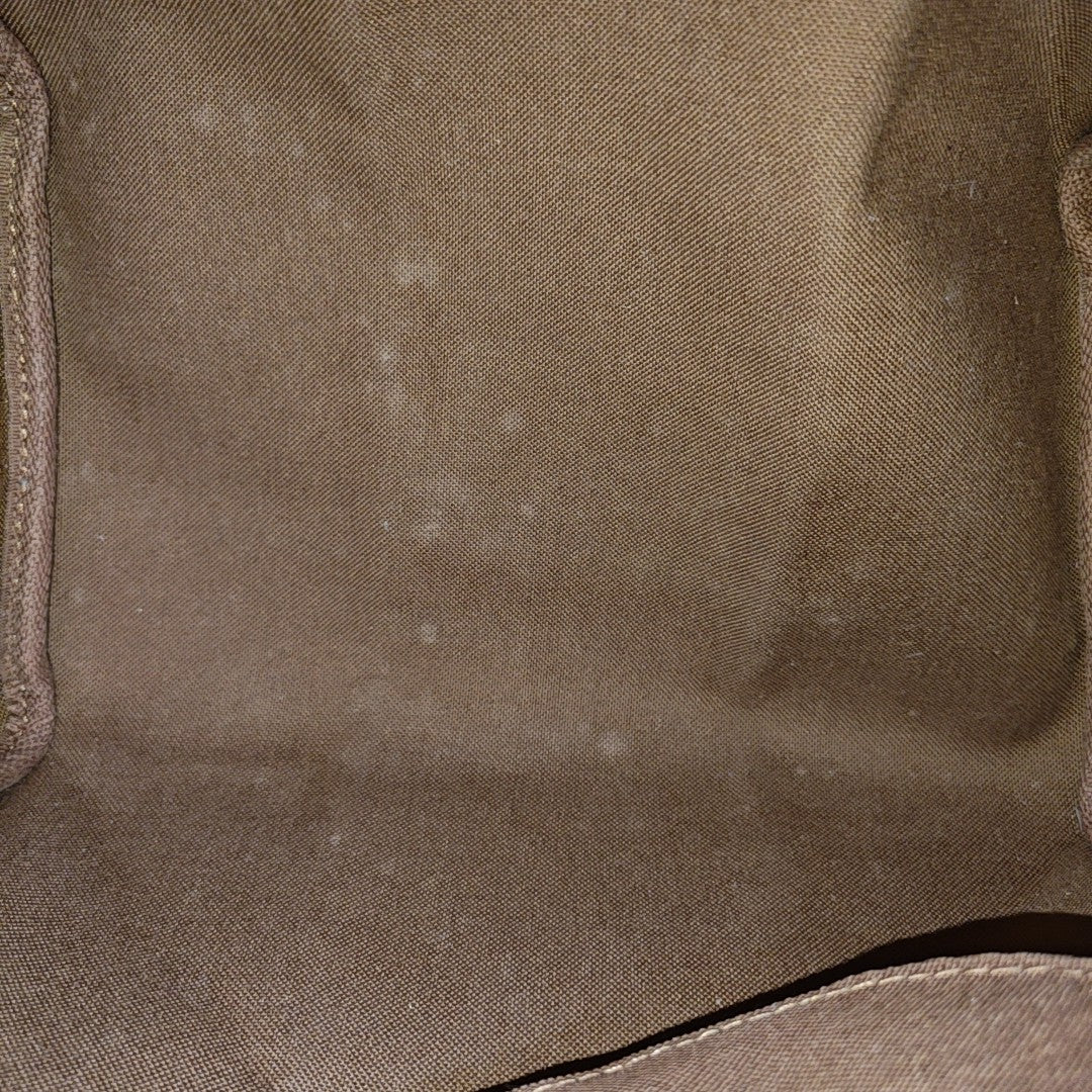 SPEEDY 25 Monogram Coated Canvas Brown