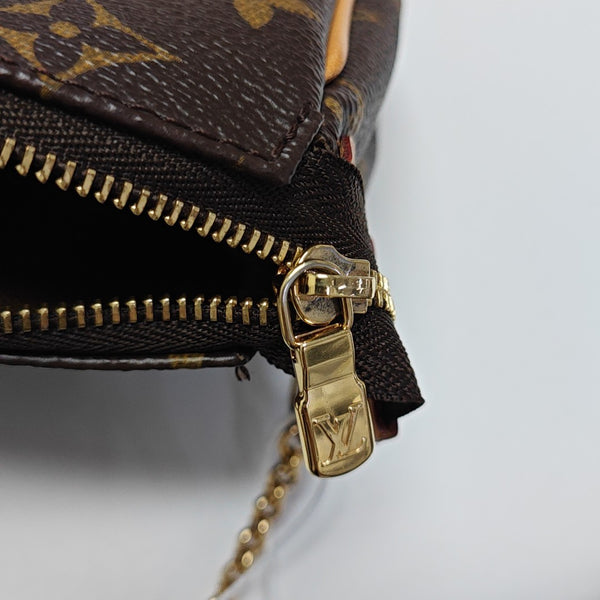 EVA Monogram Coated Canvas Brown