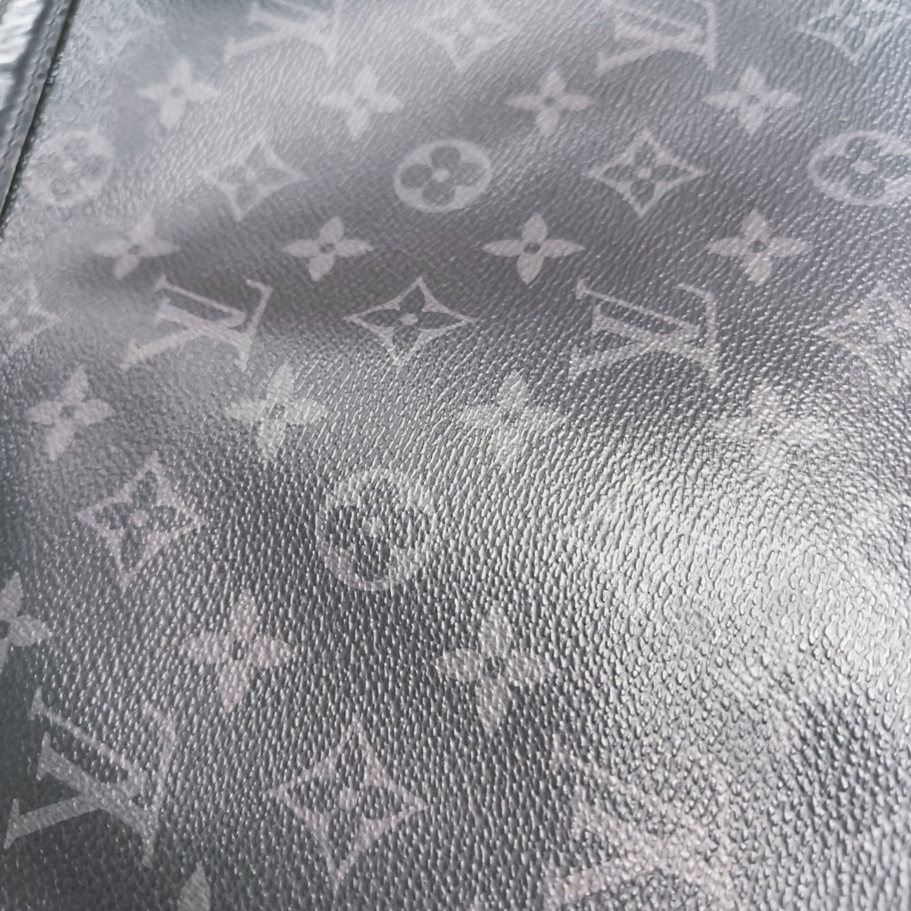 Pochette Voyag MM Monogram Coated Canvas Black