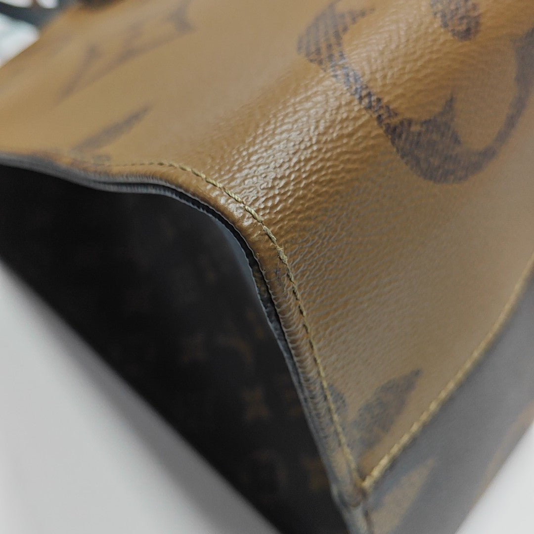 Onthego GM Lona Revestida Monogram Marrón