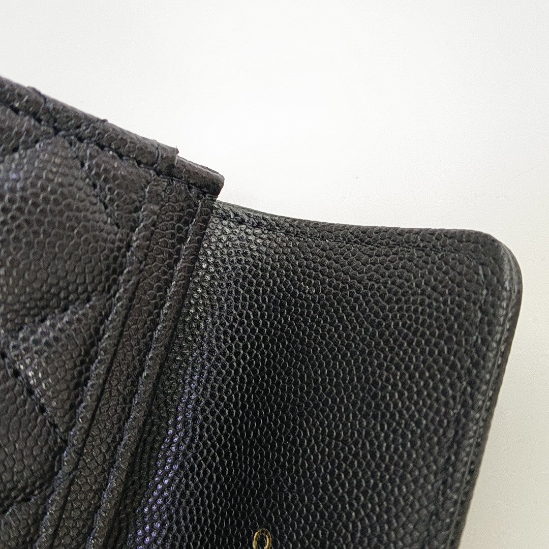Cartera BOY CHANEL de piel de becerro granulada acolchada negra