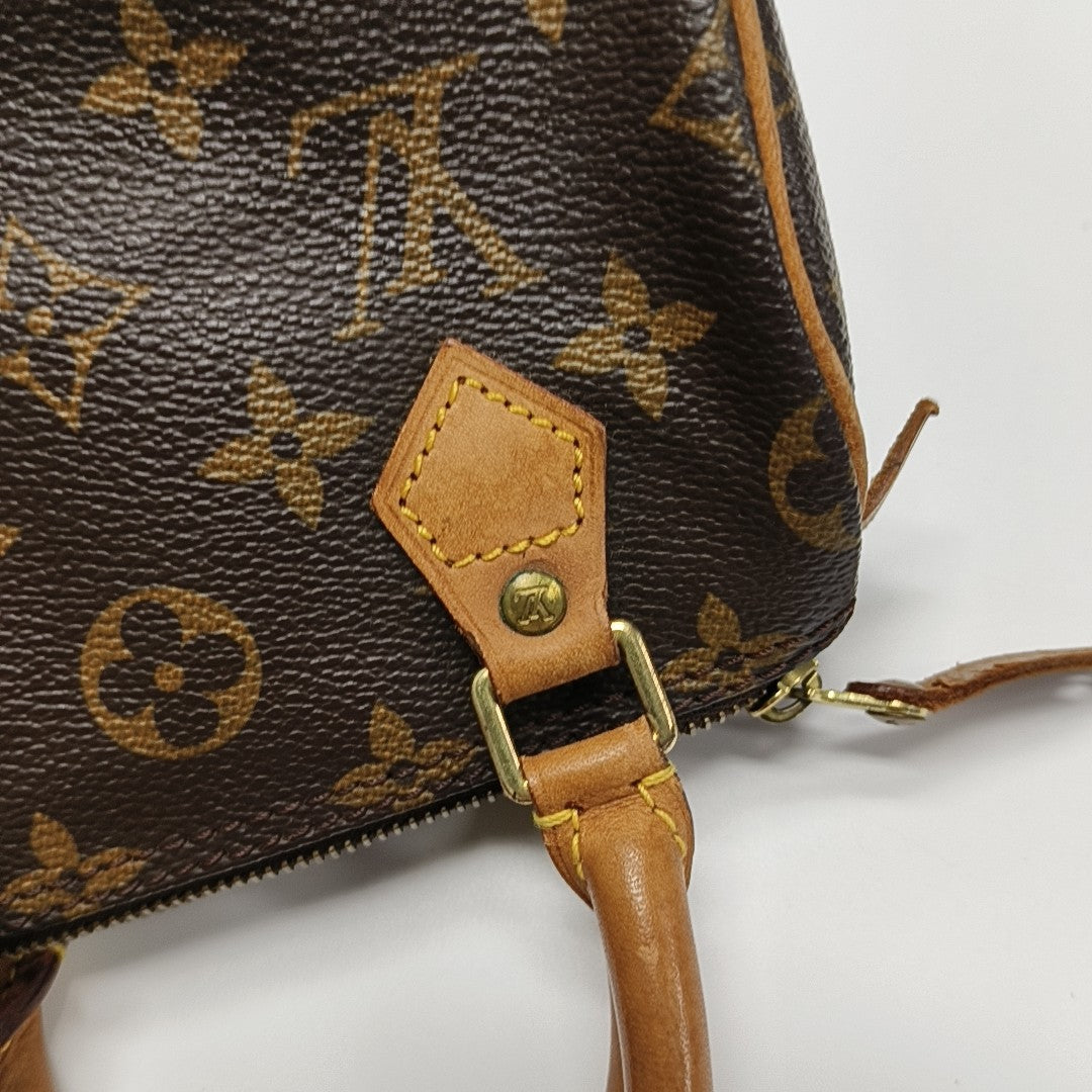 SPEEDY Monogram Coated Canvas Brown
