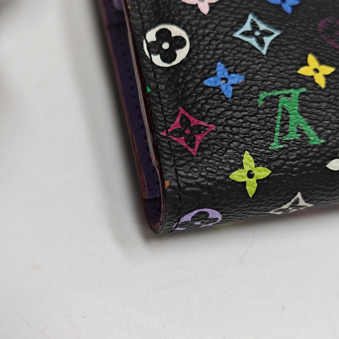 LV × TM ZIPPY Monogram Coated Canvas Black