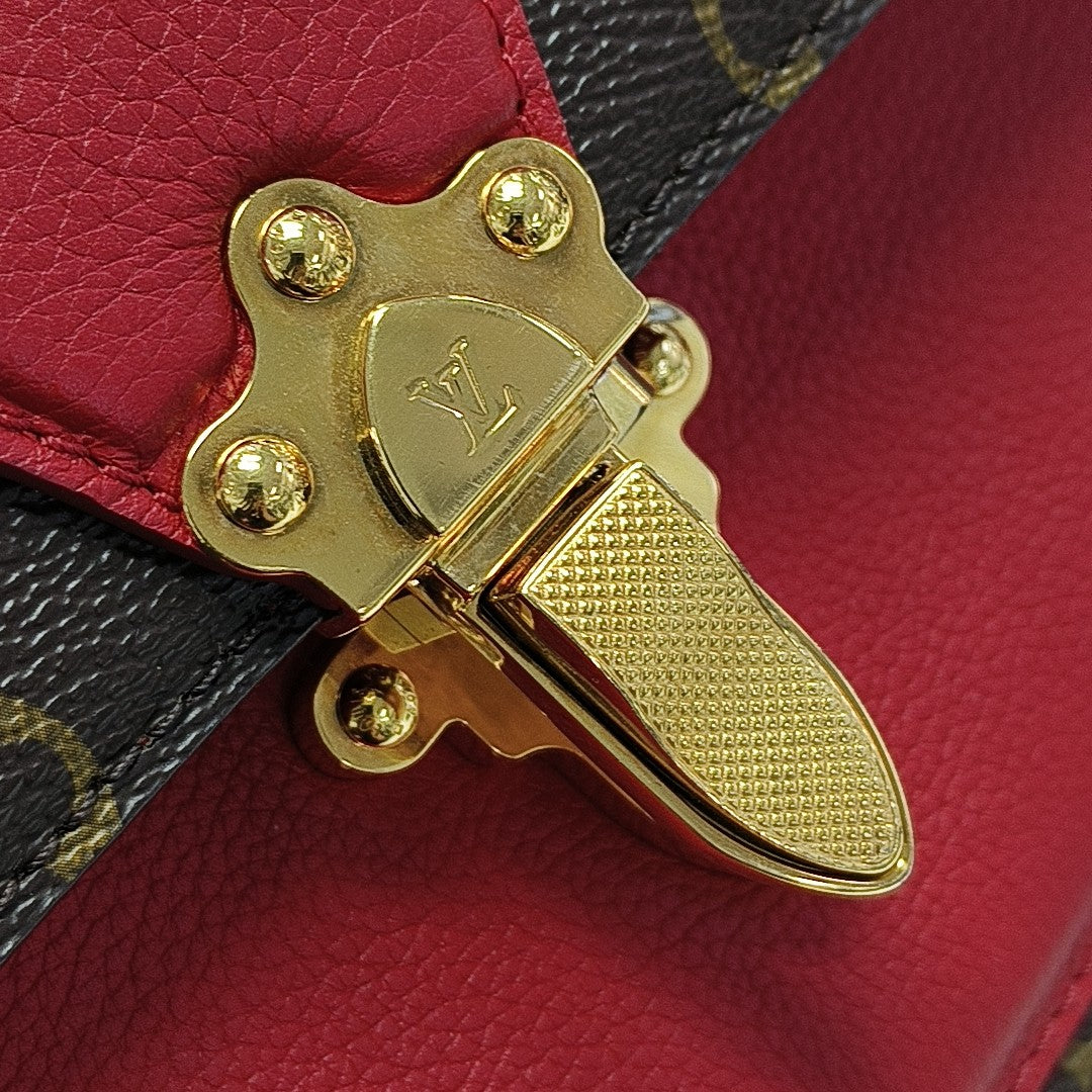 VICTOIRE Monogram Coated Canvas Brown