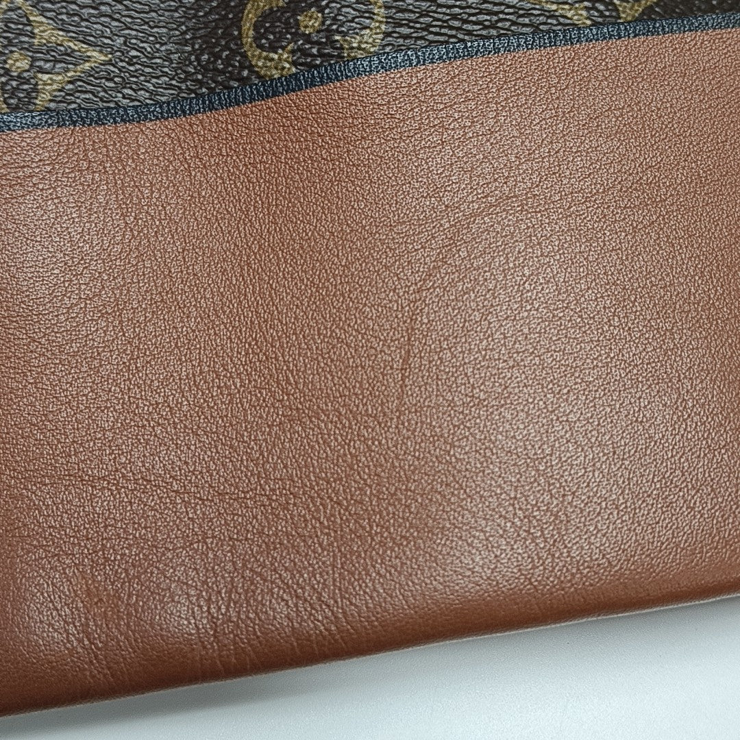 TUILERIES Monogram Coated Canvas Brown