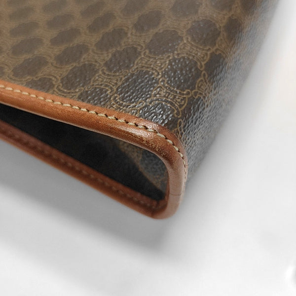 Authenticated pre-owned  MACADAM CLUTCHE Coated Canvas Brown - Clutch at Looply