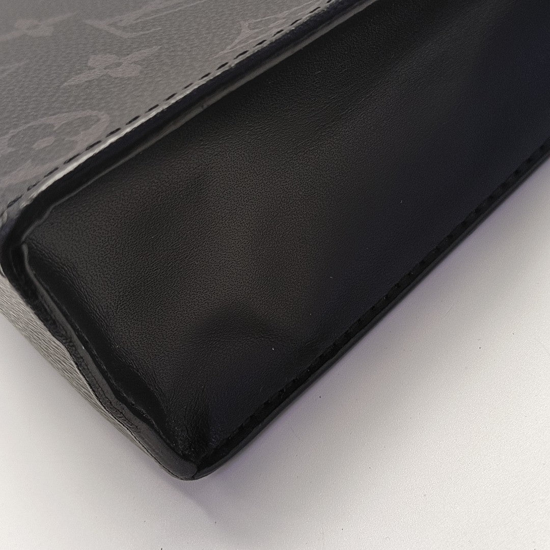 Pochette Voyag MM Monogram Coated Canvas Black