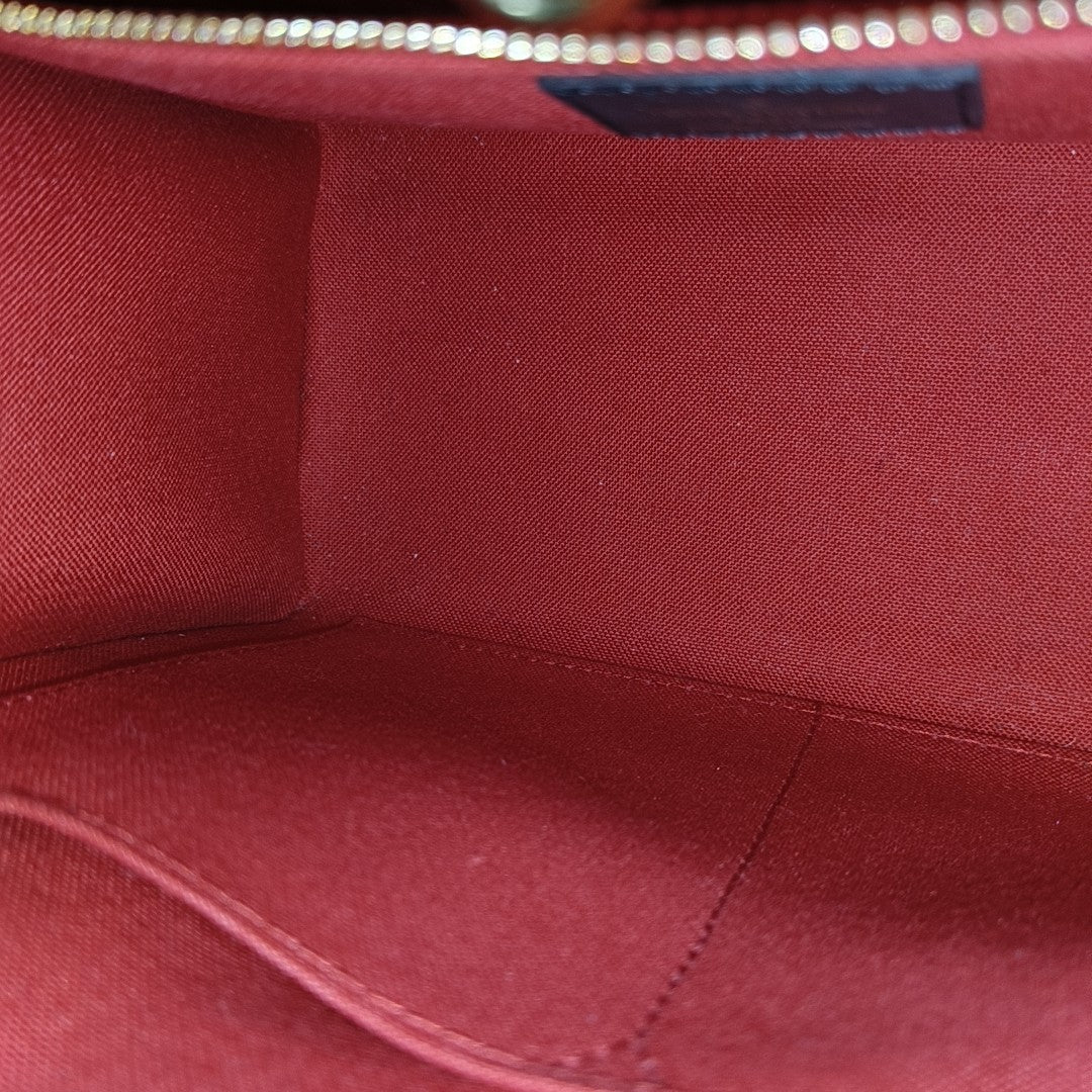 ONTHEGO PM Monogram Coated Canvas Brown
