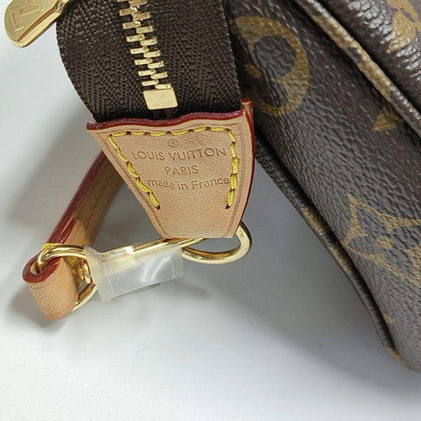POCHETTE ACCESSOIRES GM Monogram Coated Canvas Brown