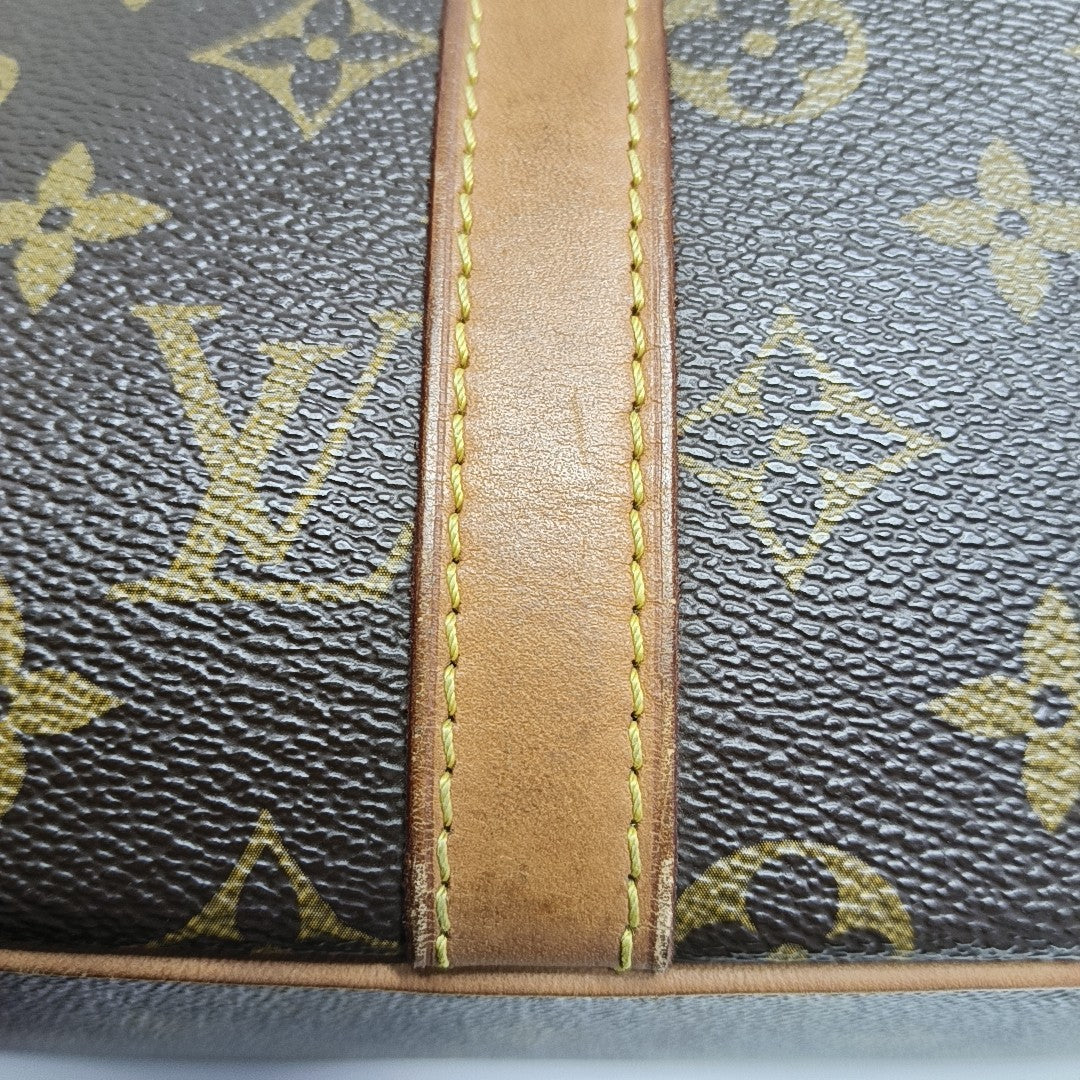 PORTE-DOCUMENTS GM Monogram Coated Canvas Brown