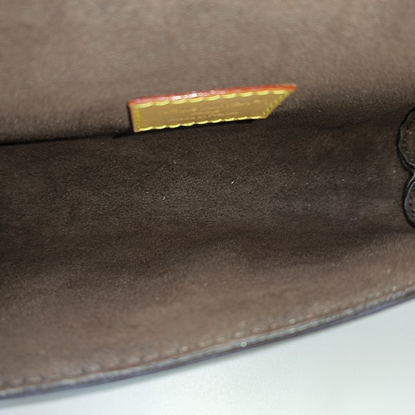 Pochette Camille Monogram Coated Canvas Brown