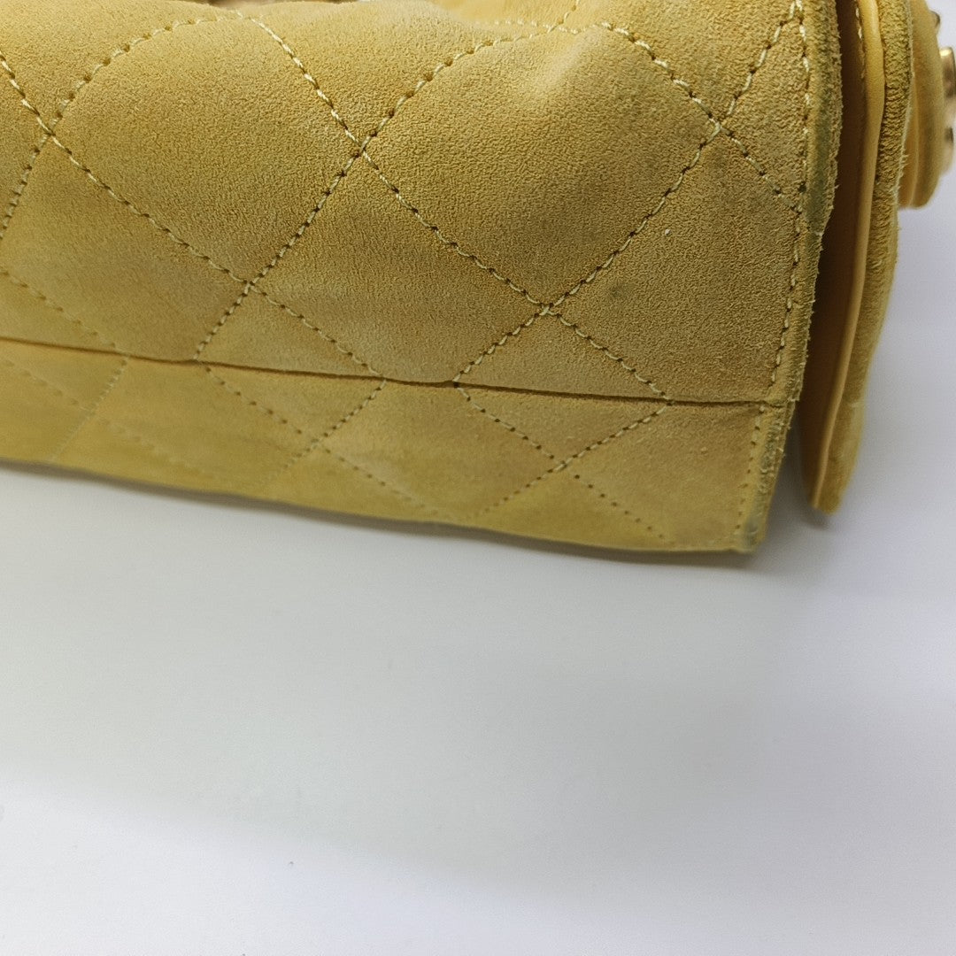 CHANEL 25 Quilted Suede Yellow