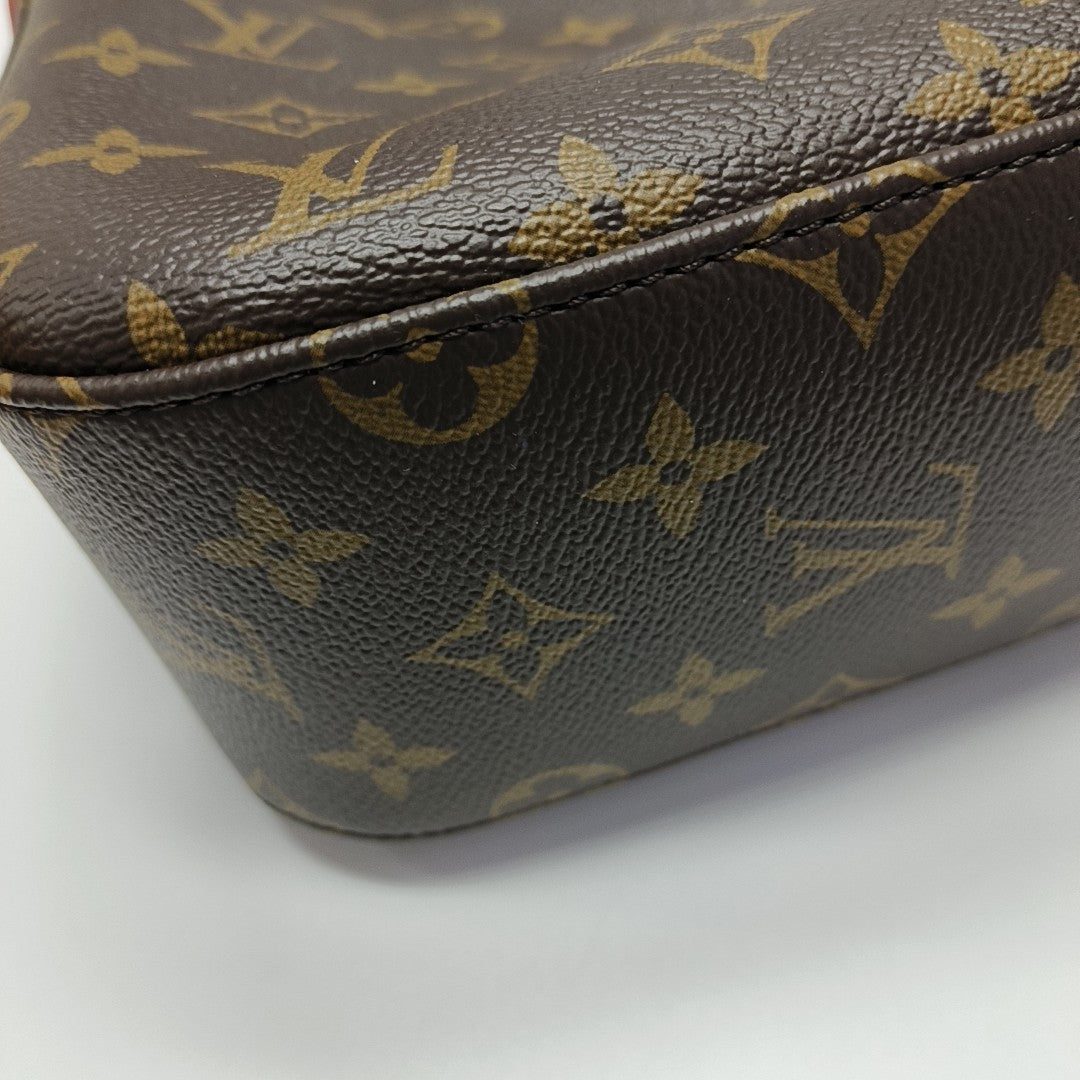 SLOUCHY PM Monogram Coated Canvas Brown