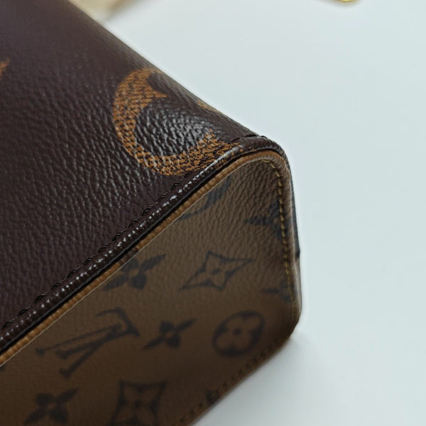ONTHEGO PM Monogram Coated Canvas Brown