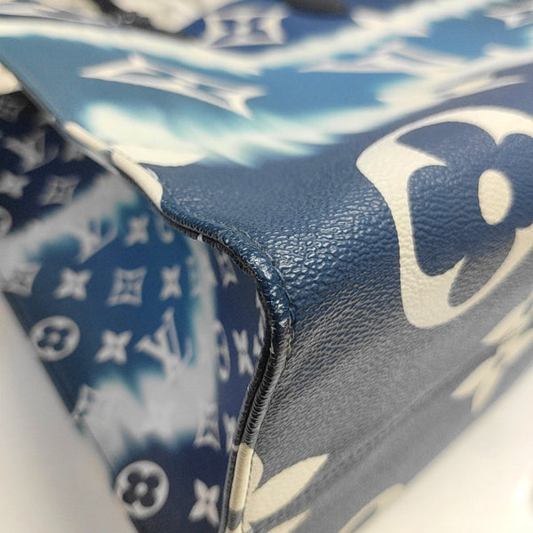 ONTHEGO GM Coated Canvas Blue