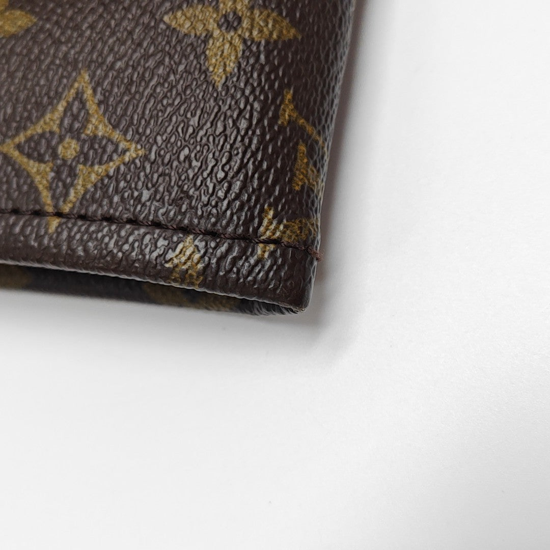 Monogram Coated Canvas Clutch Brown