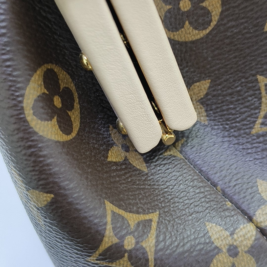 CLUTCH Monogram Coated Canvas Brown