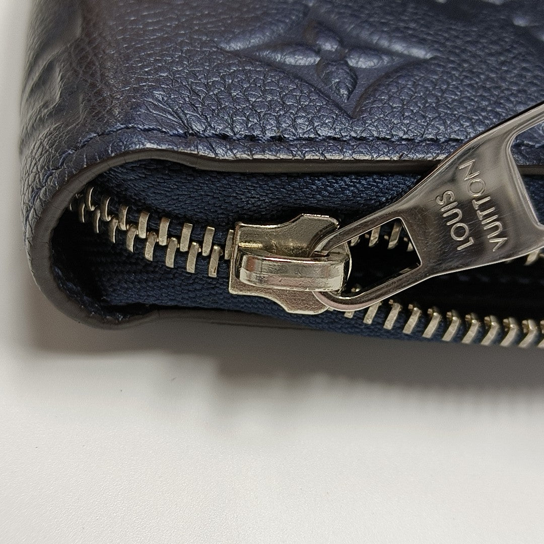 ZIPPY Monogram Calfskin Blue Wallet