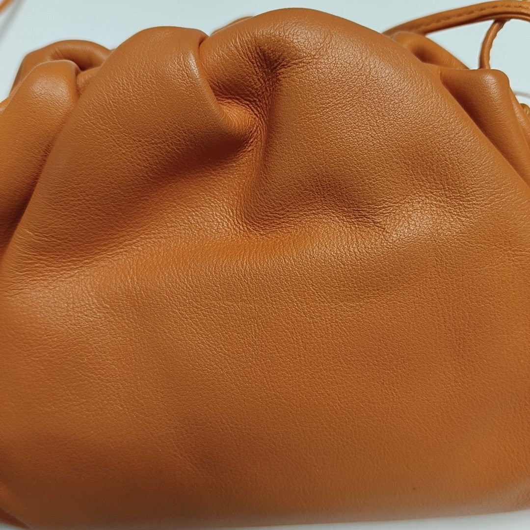 Authenticated pre-owned  The Pouch Mini Calfskin Orange - Crossbody Bag at Looply