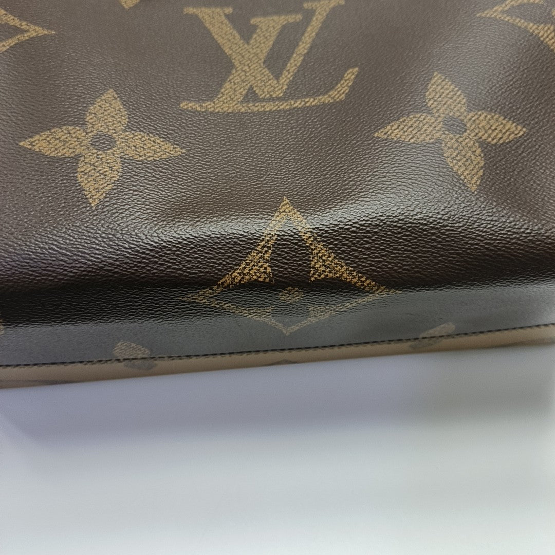 ONTHEGO MM Monogram Coated Canvas Brown
