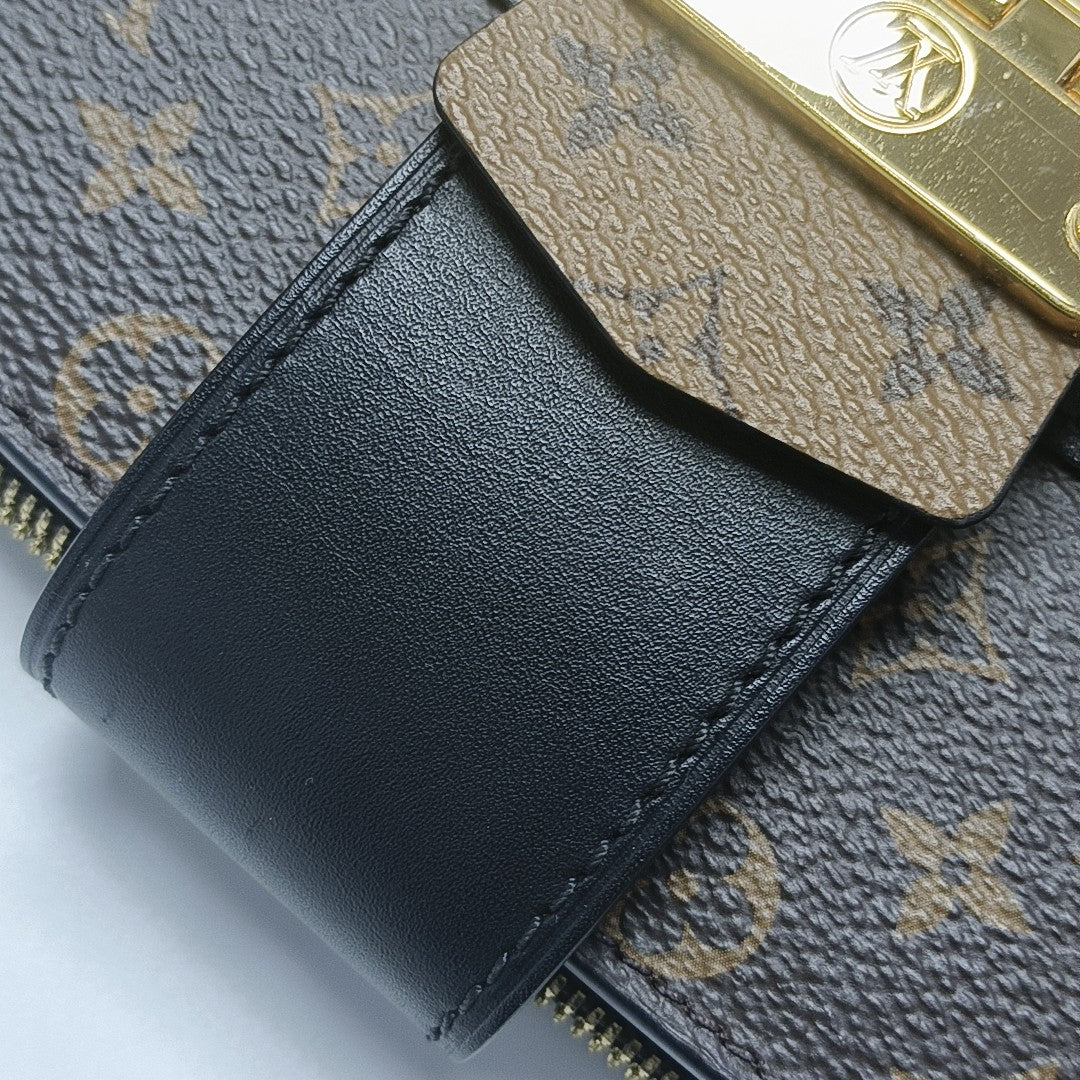 TRUNK Monogram Coated Canvas Brown