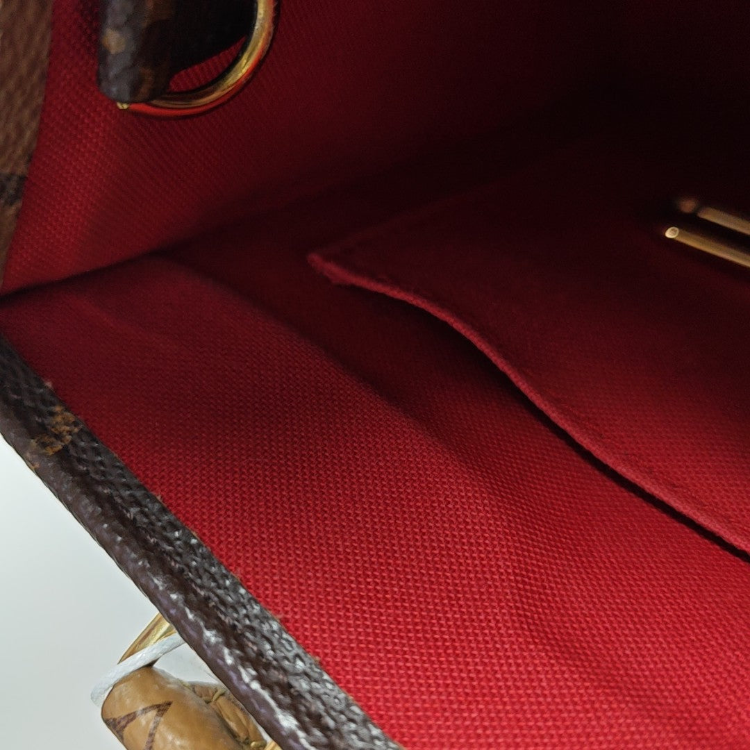 ONTHEGO PM Monogram Coated Canvas Brown