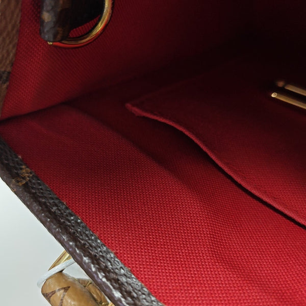 ONTHEGO PM Monogram Coated Canvas Brown