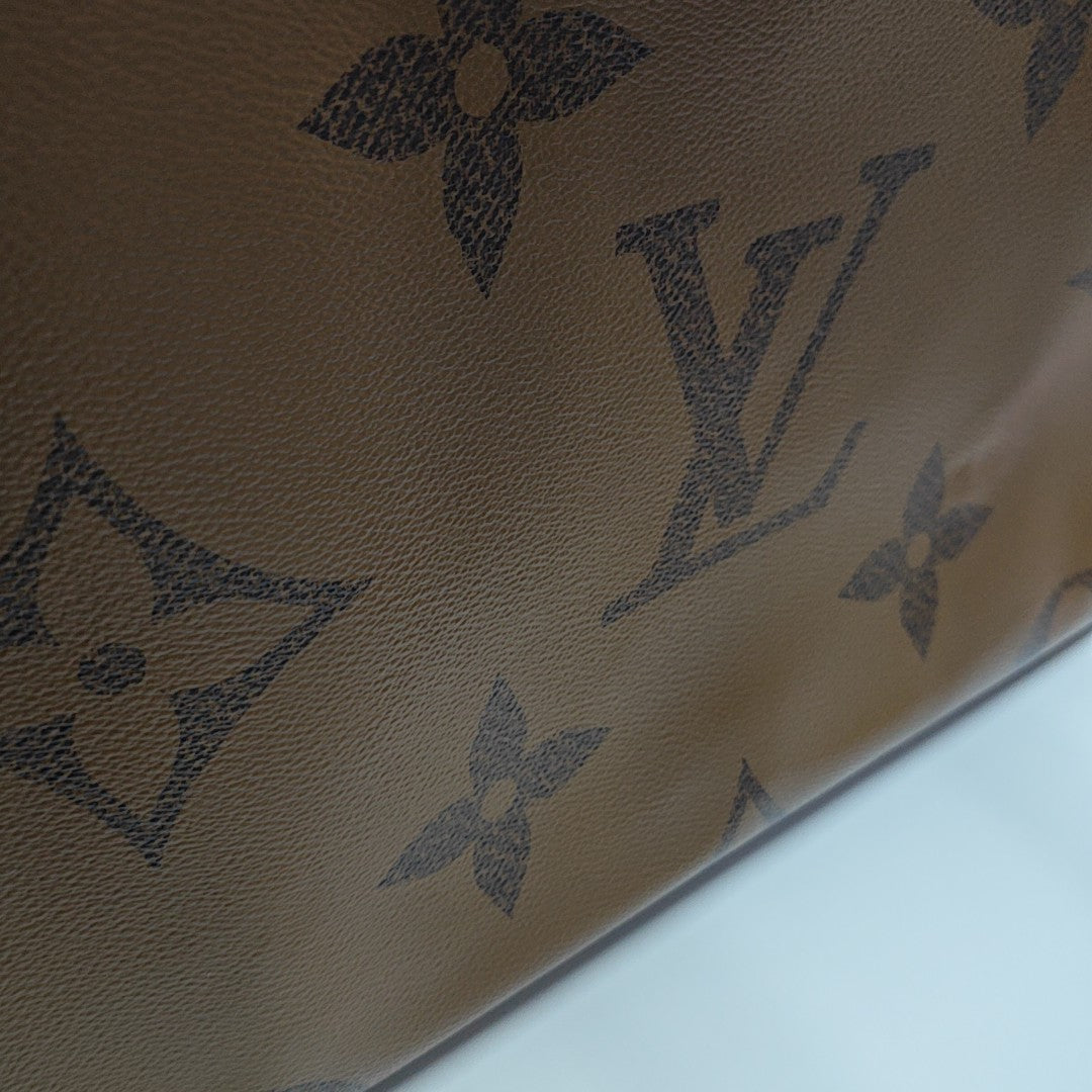 ONTHEGO GM Monogram Coated Canvas Brown