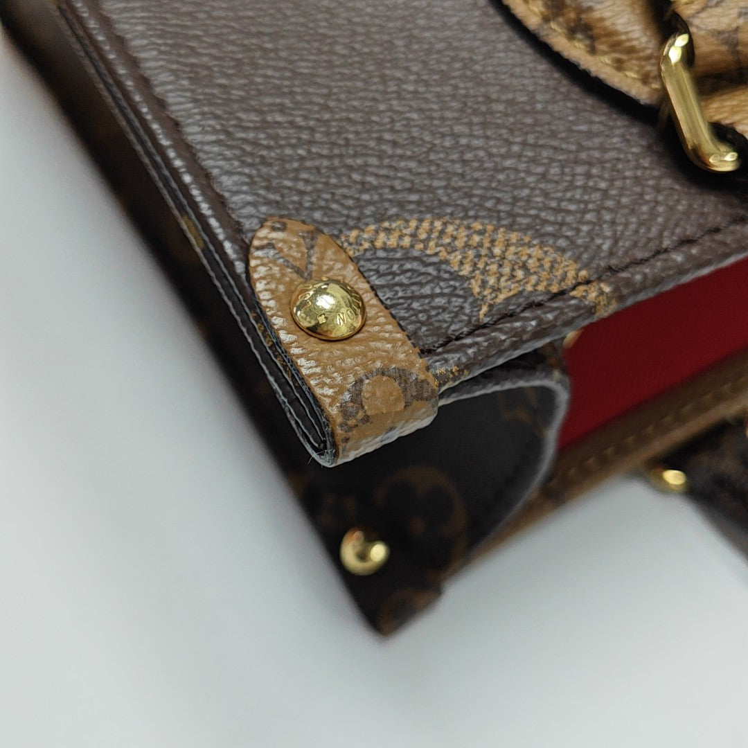 ONTHEGO PM Monogram Coated Canvas Brown
