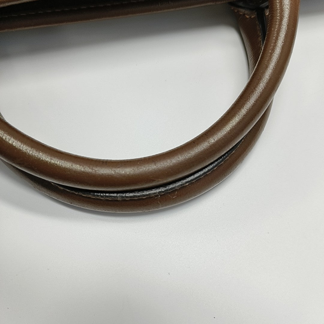 Retro Monogram Coated Canvas Brown