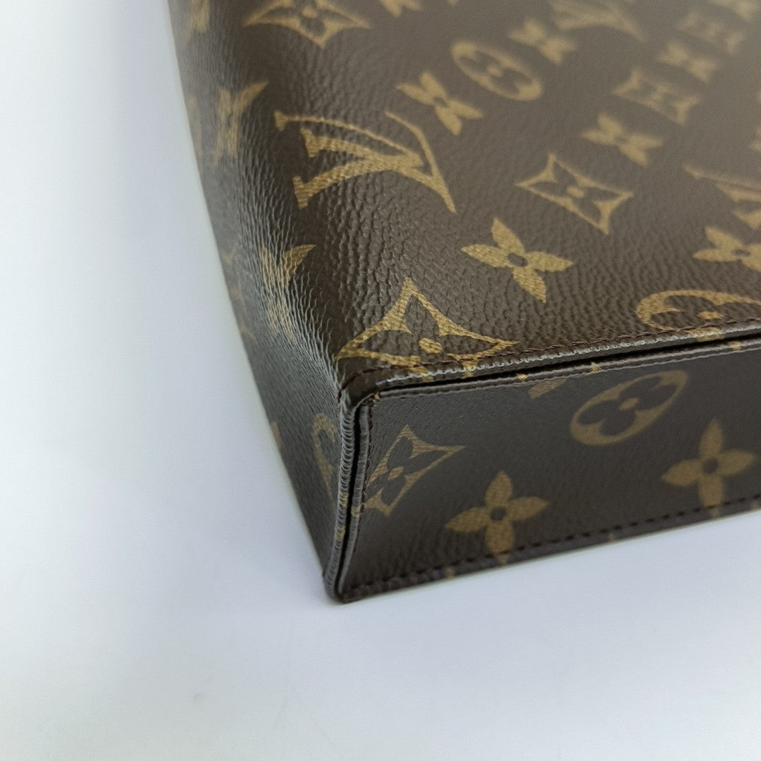 TOILET POCKET 26 Monogram Coated Canvas Brown