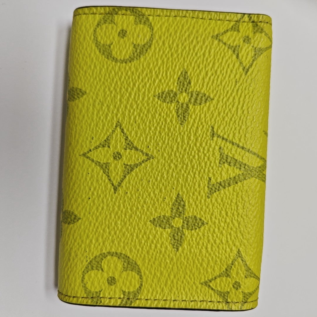 DISCOVERY Monogram Coated Canvas Yellow Card Holder