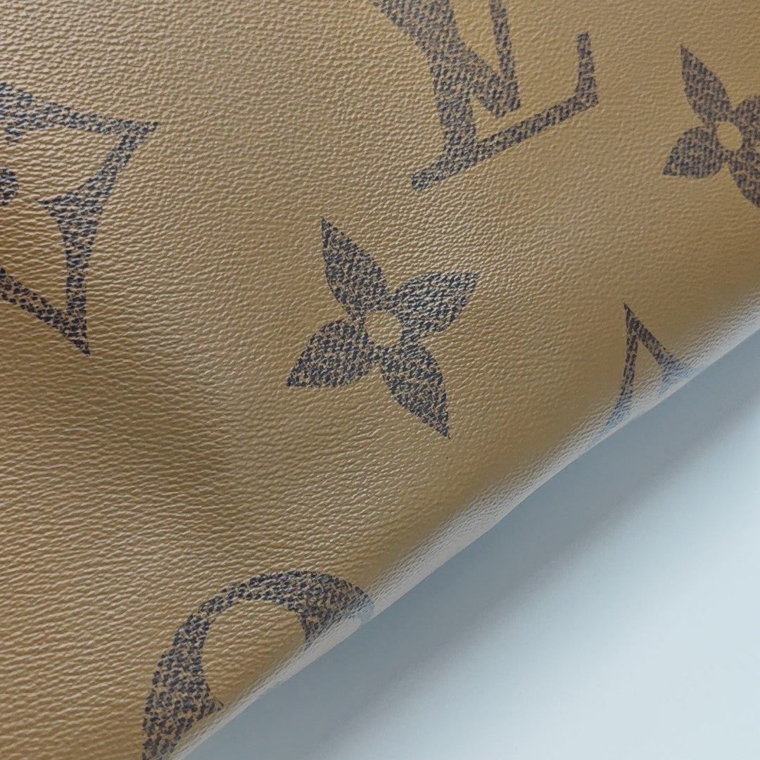 ONTHEGO GM Monogram Coated Canvas Brown