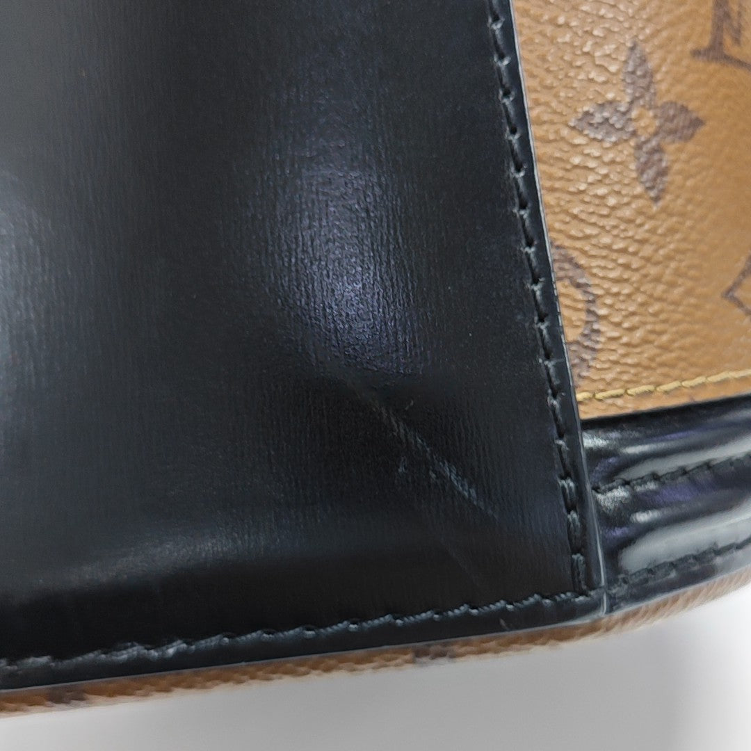 CANNES PM Monogram Coated Canvas Brown