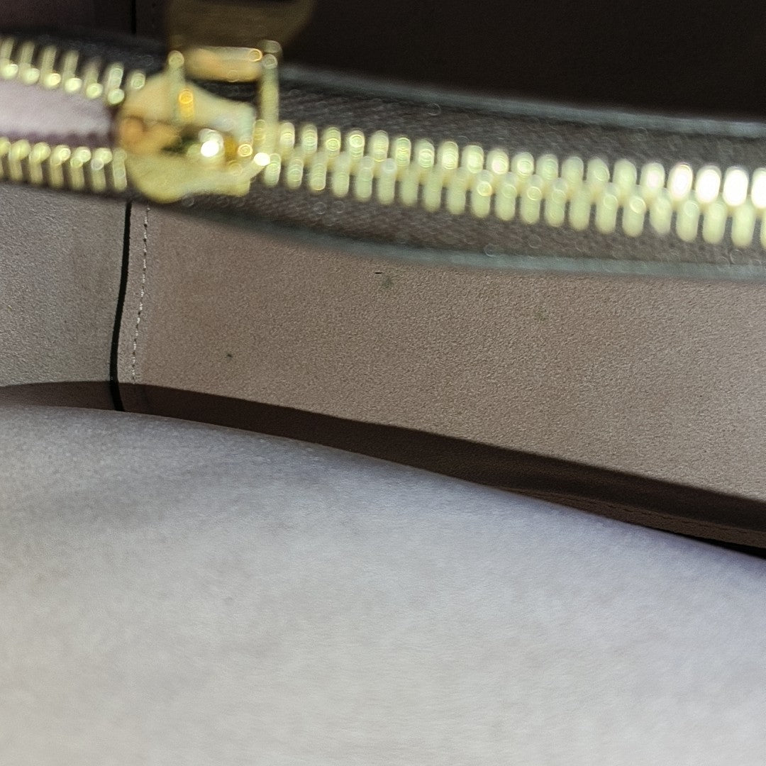 NÉONOÉ MM Monogram Coated Canvas Brown