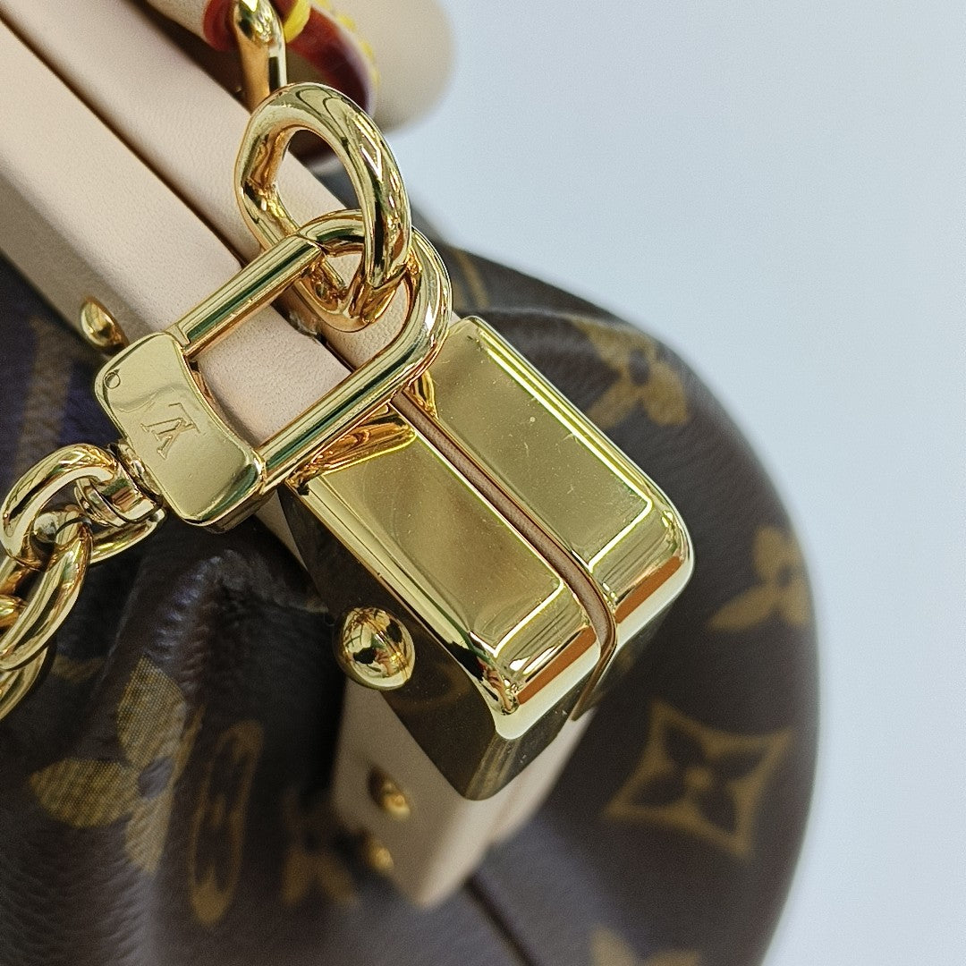 CLUTCH Monogram Coated Canvas Brown